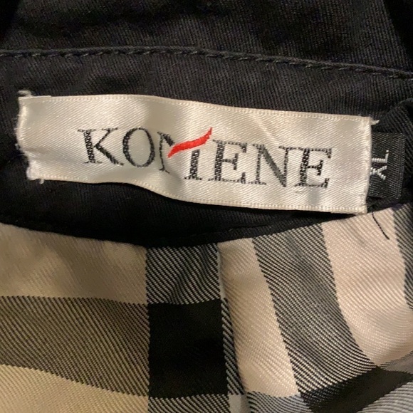 🧥 Classy Black Coat with faux leather and plaid interior - Picture 4 of 12